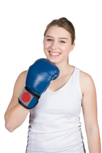 Mujer sostiene guante de boxeo debajo de su barbilla Fotos de stock