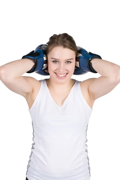 Mujer sostiene guantes de boxeo contra su cabeza Imágenes de stock libres de derechos