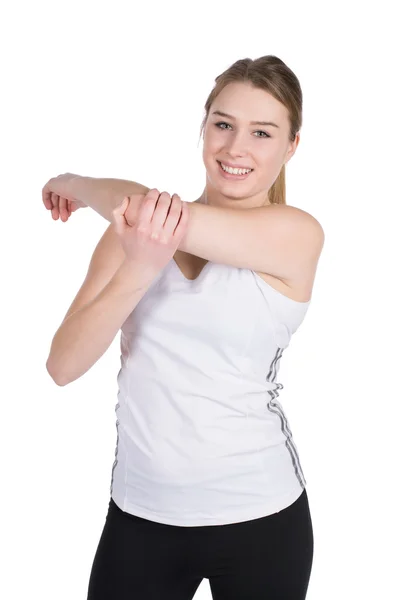 Young woman stretches her musculature — Stock Photo, Image