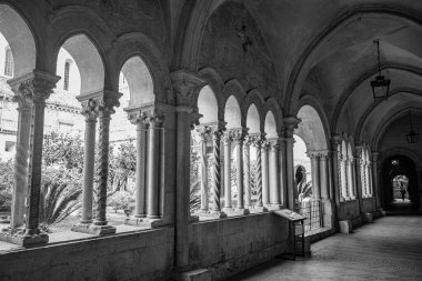 May 1, 2022 - Priverno, Latina, Lazio, Italy - The Fossanova Abbey. The cloister with its splendid colonnade, portico and cross vaults. Twilight, solitude and silence.