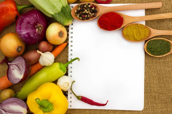 Vegetables and paper for notes — Stock Photo, Image