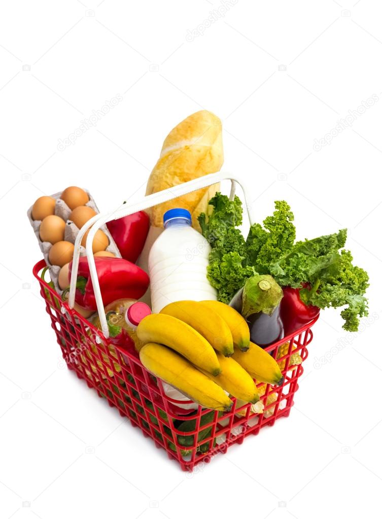 Shopping basket full of fresh colorful groceries