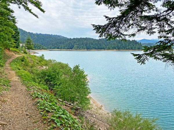 Hiking and recreational trails along Omladinsko Lake or bicycle paths around Lokvarsko Lake, Lokve - Croatia (Pjesacko-biciklisticke staze oko Omladinskog ili Lokvarskog jezera, Lokve - Gorski kotar, Hrvatska)