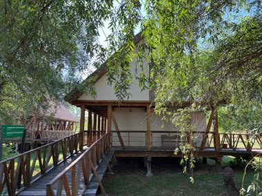 Houses on the water with thatched roofs, Kopacki rit Nature park - Kopacevo, Croatia (Sojenice ili kuce na vodi sa slamnatim krovovima, Park prirode Kopacki rit - Kopacevo, Hrvatska)