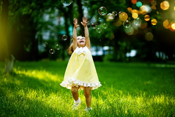 Girl with bubbles — Stock Photo, Image