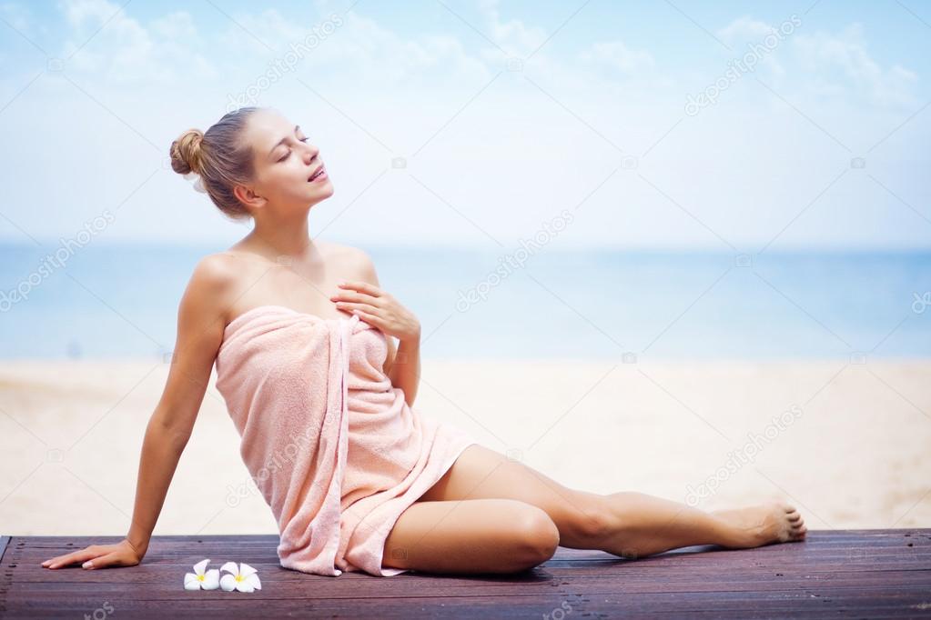 Young woman in beach spa