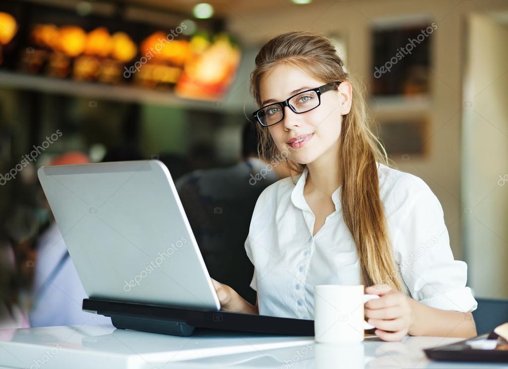 Woman with laptop (soft focus on eyes) stock vector