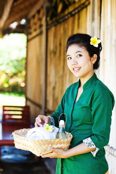 Masseuse holding spa ingredients — Stock Photo, Image