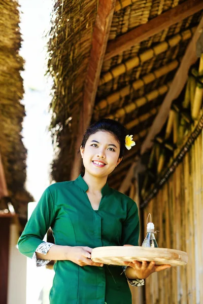 Masseuse holding spa ingredients — Stock Photo, Image