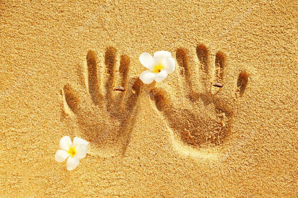 Prints of love on the sand Stock Photo by ©apid 30761973