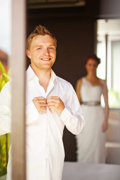 Groom and bride preparing in the morning — Stock Photo, Image