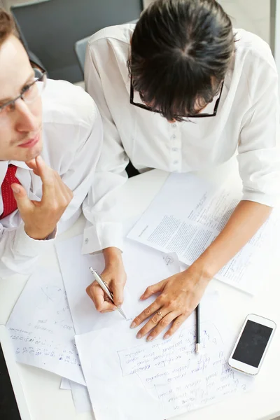 Two office workers creating together — Stock Photo, Image