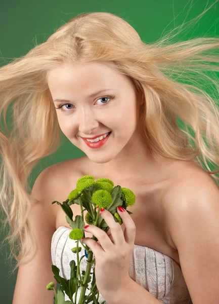Girl with green chrysanthemum — Stock Photo, Image