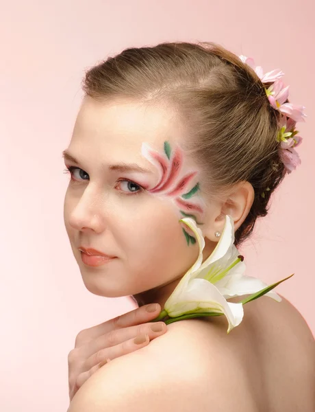 Beauty flower girl on the pink background — Stock Photo, Image