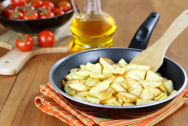 Roast potatoes in a frying pan — Stock Photo, Image