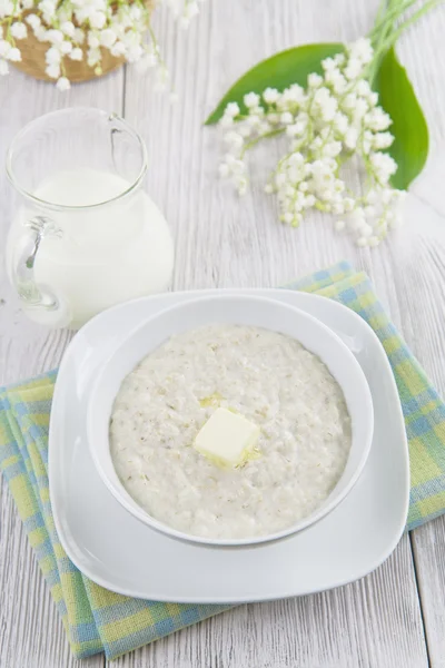 Oatmeal porridge with butter — Stock Photo, Image