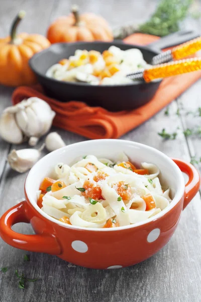 Noodles with pumpkin and parmesan — Stock Photo, Image
