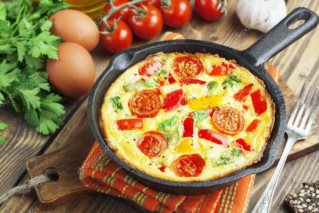 Omelet with vegetables and cheese. Frittata Stock Photo by ©minadezhda ...