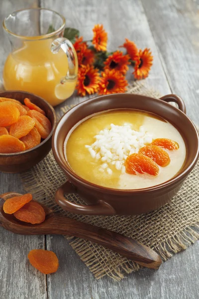 Rice soup with dried apricots — Stock Photo, Image