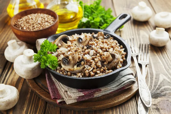 Buckwheat porridge with mushrooms — Stock Photo, Image