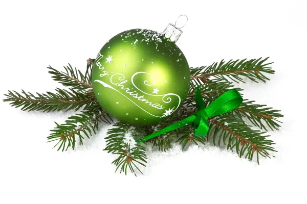 Green christmas ball with fir branch isolated on white — Stock Photo, Image