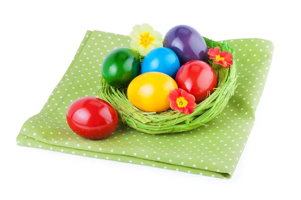 Easter Eggs in natural straw nest — Stock Photo, Image