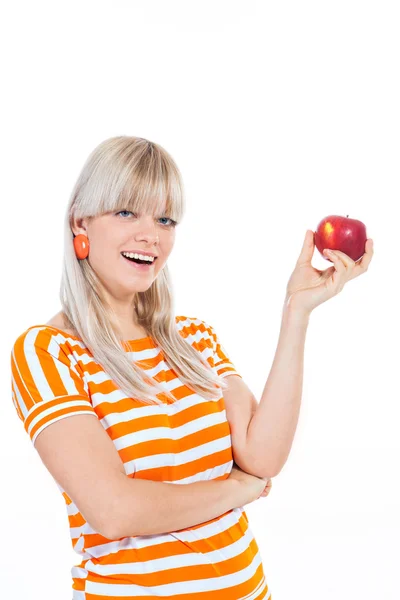 Красивая девушка держит яблоко — стоковое фото