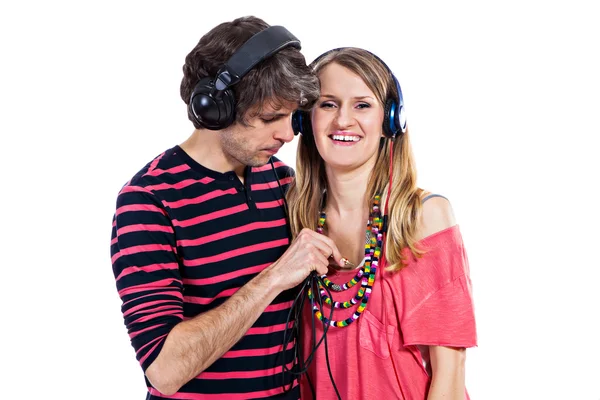 Pareja con auriculares — Foto de Stock