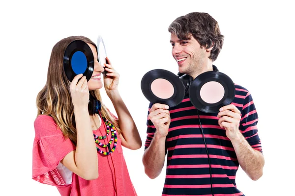 Casal brincando com discos de vinil — Fotografia de Stock