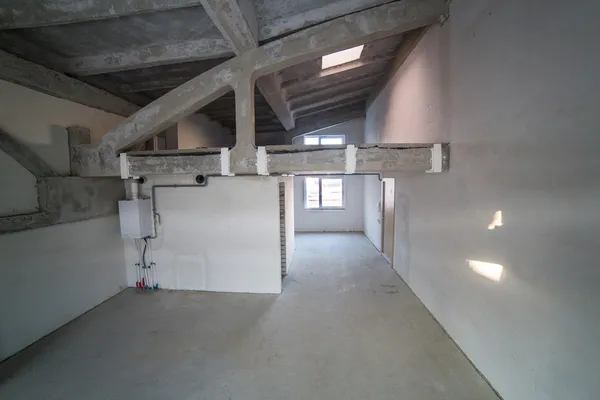 Empty spacious loft under construction Stock Picture