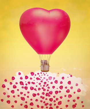 gökyüzünde bir kalp şekilli balon fil.
