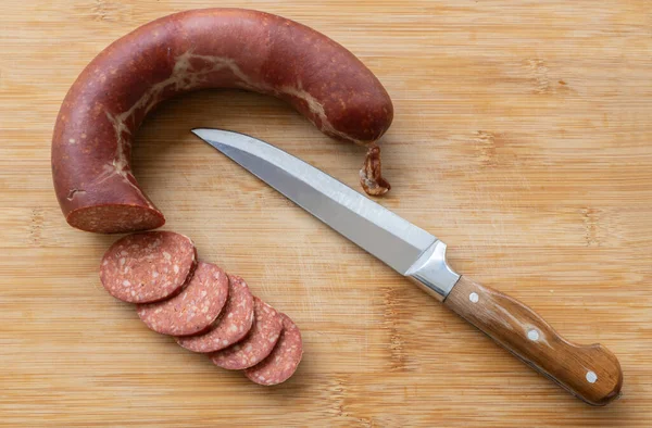 Sliced Turkish Sausages Isolated Wooden Background — Stock Photo, Image