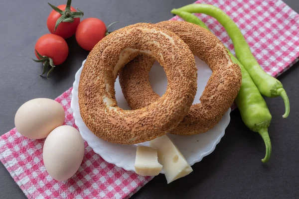 Turkish fast food bagel called Simit. Turkish bagel Simit with sesame. Bagel is traditional Turkish bakery food.