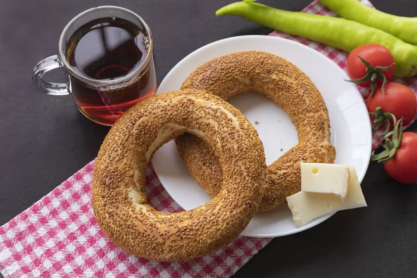 Turkish fast food bagel called Simit. Turkish bagel Simit with sesame. Bagel is traditional Turkish bakery food.