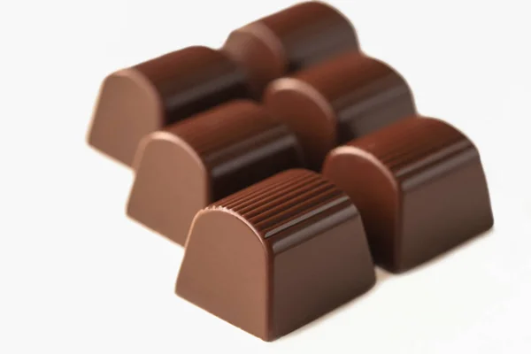 Melk Chocolade Kubussen Geïsoleerd Witte Achtergrond — Stockfoto