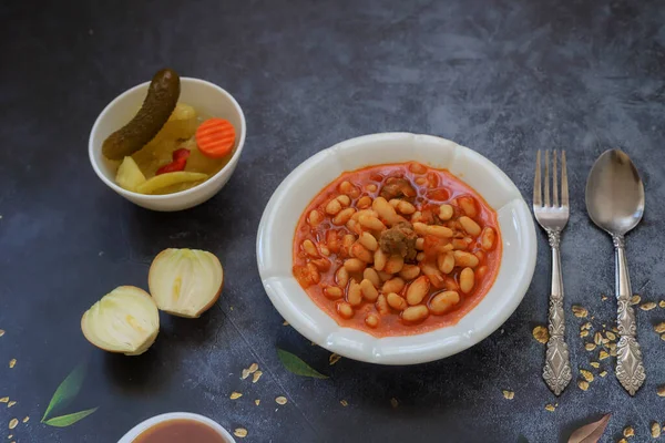 Turkish foods on a gray marble area; dried bean