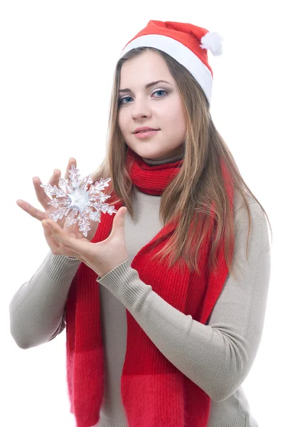 Mädchen mit der Schneeflocke in der Hand — Stockfoto