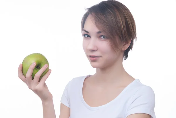 Pretty young girl with green apple — Stock Photo, Image