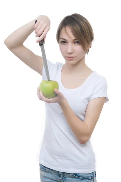 Pretty young girl with green apple and knife — Stock Photo, Image