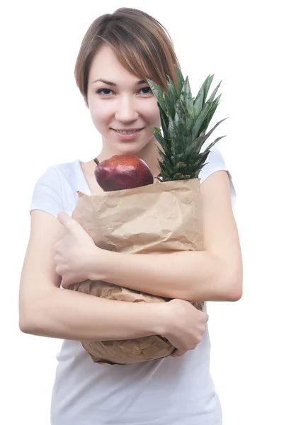 Dziewczyna z pakietem owoce i zielone jabłko — Zdjęcie stockowe