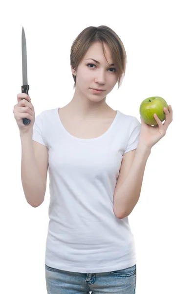 Krásná mladá dívka s zelené jablko a nůž — Stock fotografie