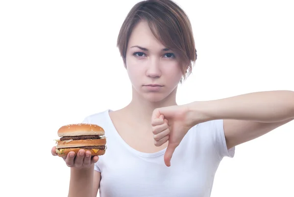 Portrait of girl with humburger showing thumb down — Stock Photo, Image