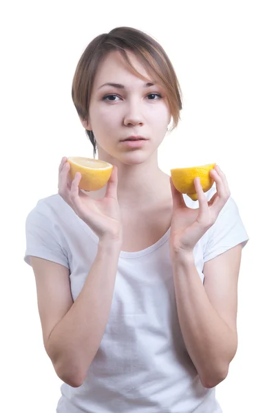 Two lemons in girl's hands — Stock Photo, Image