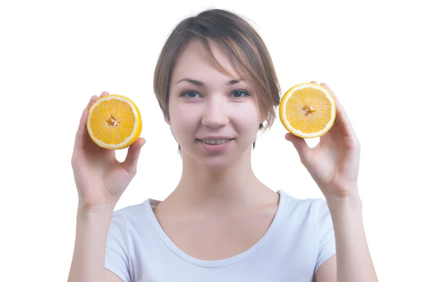 Two lemons in girl's hands — Stock Photo, Image