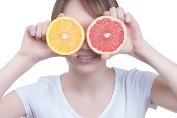 Girl holding the half of lemon and grapefruit — Stock Photo, Image