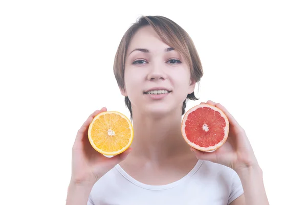 Girl holding the half of lemon and grapefruit — Stock Photo, Image