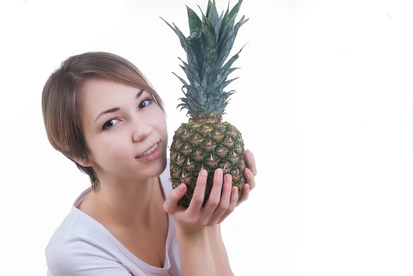 Smilling girl with pinaple — Stock Photo, Image