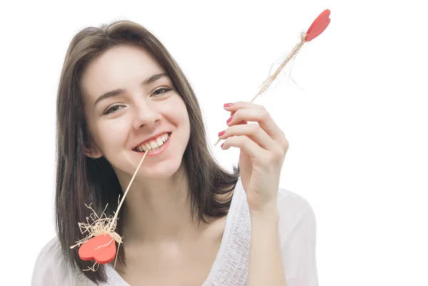 Bella mujer sosteniendo corazones sonriendo — Foto de Stock