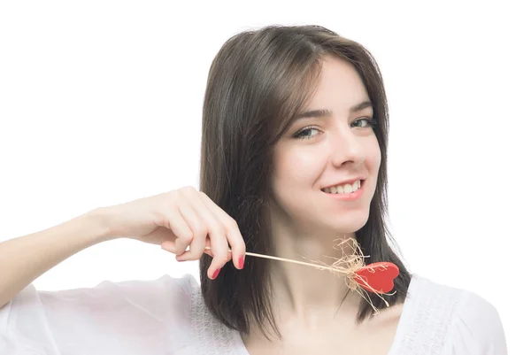 Beautiful woman holding hearts smiling — стоковое фото