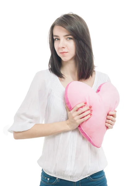 Dívka s valentine růžový polštář srdce — Stock fotografie